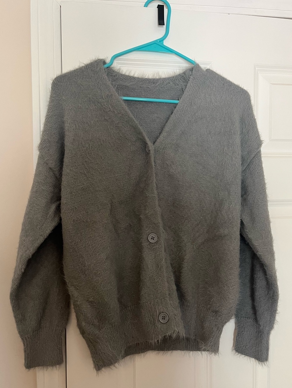 gray fuzzy v‑neck button cardigan sweater